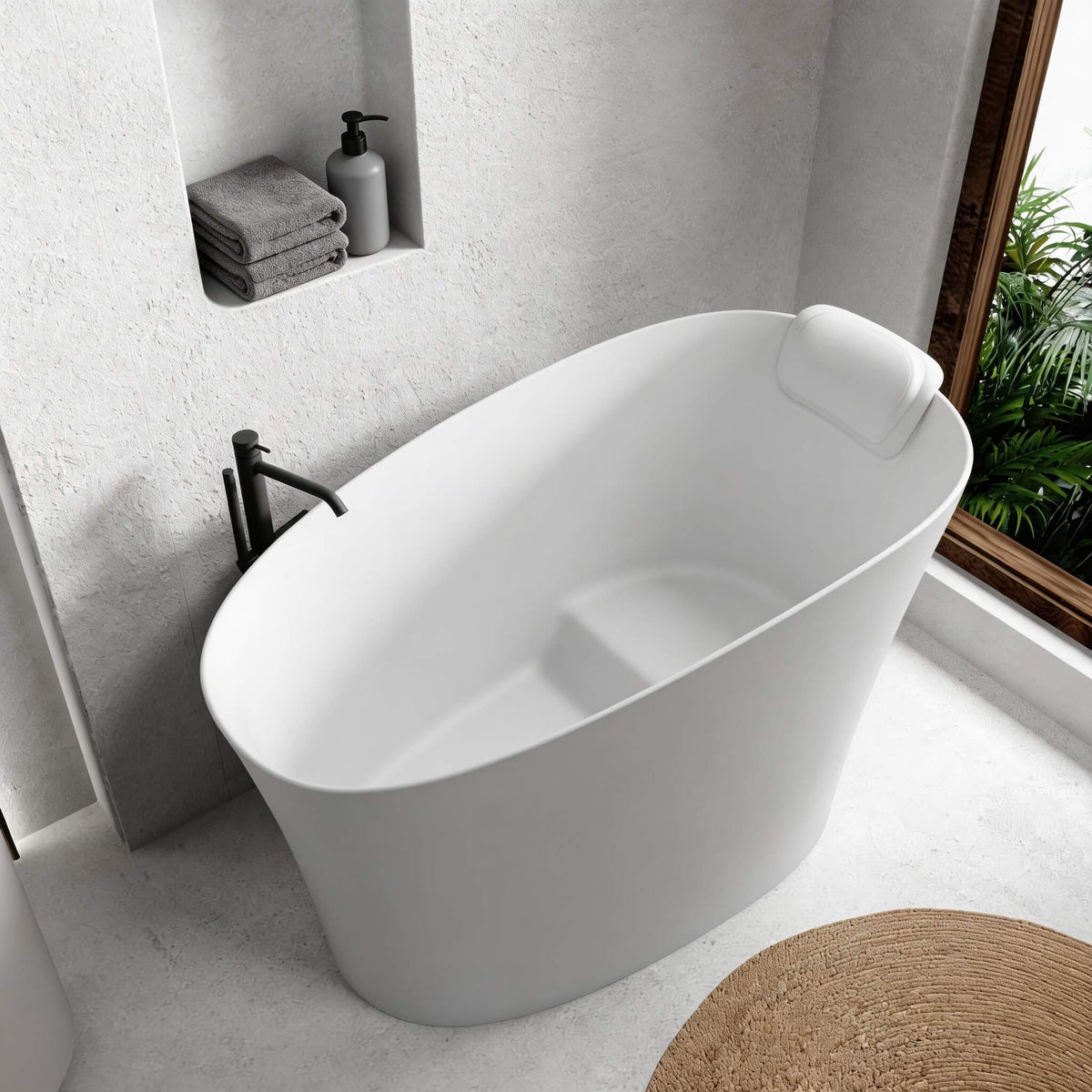 Nuvia 51-Inch Solid Surface Oval Freestanding Bathtub with Seat and Headrest